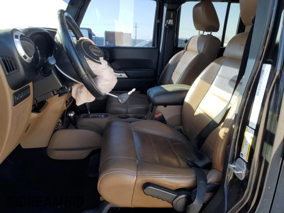 2012 Jeep Wrangler Unlimited Rubicon z VIN 1C4HJWFG9CL105047, wystawiony jako Copart lot #49494005 z przebiegiem 132 591 mil mil oraz Szkoda całkowita • Salvage title. Historia ofert i sprzedaży dostępna na DreamBid. Obrazek 7.