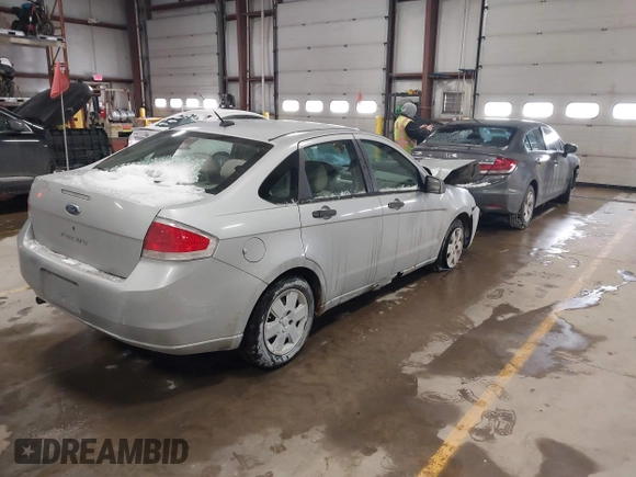 2009 Ford Focus S with VIN 1FAHP34N99W107098, listed as a IAAI auction lot 41610814 with 80,428 mi miles. Bid and sale history available at carsss.com. Image 4.