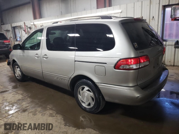 2002 Toyota Sienna LE with VIN 4T3ZF13C02U446097, listed as a Copart auction lot 77127844 with 182,873 mi miles and Salvage Title. Bid and sale history available at carsss.com. Image 2.