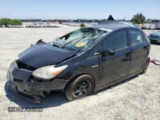 2013 Toyota Prius One z VIN JTDKN3DU7D0345945, wystawiony jako Copart lot #57703325 z przebiegiem Nie podano mil oraz Szkoda całkowita • Salvage title. Historia ofert i sprzedaży dostępna na DreamBid. Obrazek 1.