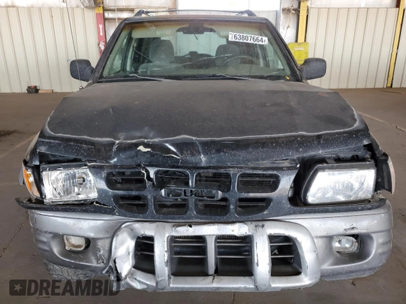 2001 Isuzu Rodeo S with VIN 4S2CK58W614344850, listed as a Copart auction lot 63807664 with 176,203 mi miles and Salvage title. Bid and sale history available at DreamBid. Image 5.