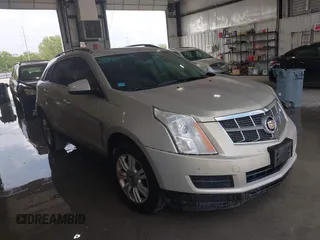 2012 Cadillac SRX z VIN 3GYFNGE38CS572089, wystawiony jako IAAI lot #42283415 z przebiegiem 188 060 mil mil oraz . Historia ofert i sprzedaży dostępna na DreamBid. Obrazek 1.