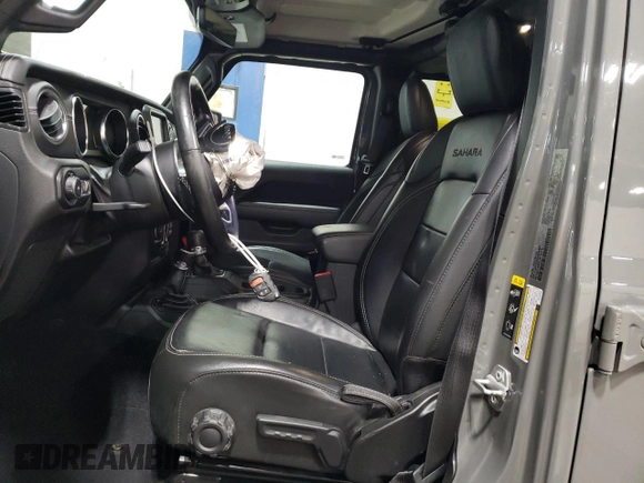 2022 Jeep Wrangler Unlimited Sahara Altitude with VIN 1C4HJXEG4NW248402, listed as a Copart auction lot 63052465 with 36,732 mi miles and Salvage title. Bid and sale history available at DreamBid. Image 7.