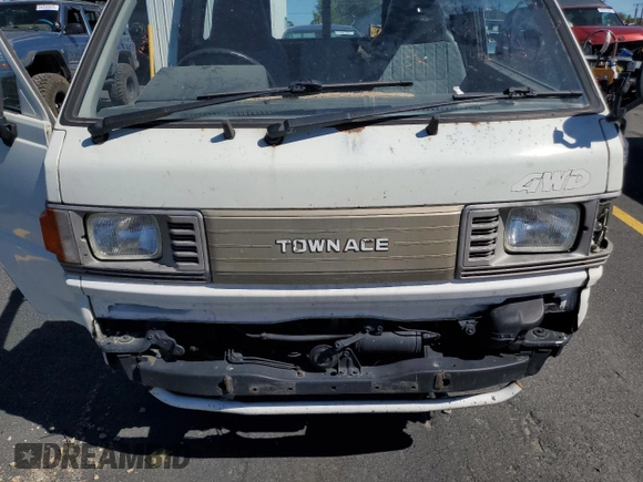 1994 Toyota Tacoma with VIN CM600012981, listed as a Copart auction lot 64052155 with 237,536 mi miles and Salvage title. Bid and sale history available at DreamBid. Image 11.