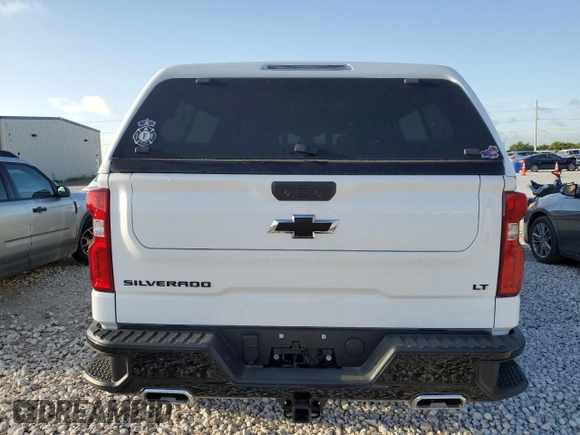 2023 Chevrolet Silverado 1500 LT Trail Boss with VIN 3GCUDFE8XPG329141, listed as a Copart auction lot 65902224 with 10,132 mi miles and Salvage Title. Bid and sale history available at DreamBid. Image 6.