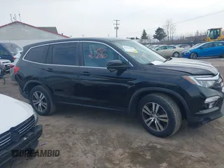 2017 Honda Pilot EX with VIN 5FNYF6H35HB089810, listed as a IAAI auction lot 41612186 with 116,489 mi miles and . Bid and sale history available at DreamBid. Image 13.