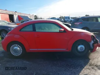 2014 Volkswagen Beetle 2.5L w/Sun with VIN 3VWJP7AT8EM629573, listed as a IAAI auction lot 41479054 with 73,950 mi miles and . Bid and sale history available at DreamBid. Image 13.
