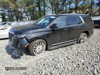 2022 Cadillac Escalade Premium Luxury z VIN 1GYS4BKL9NR143137, wystawiony jako Copart lot #55145505 z przebiegiem 56 001 mil mil oraz Szkoda całkowita • Salvage title. Historia ofert i sprzedaży dostępna na DreamBid. Obrazek 1.