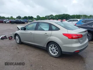 2016 Ford Focus SE z VIN 1FADP3F28GL300925, wystawiony jako IAAI lot #42563251 z przebiegiem 93 247 mil mil oraz . Historia ofert i sprzedaży dostępna na DreamBid. Obrazek 3.