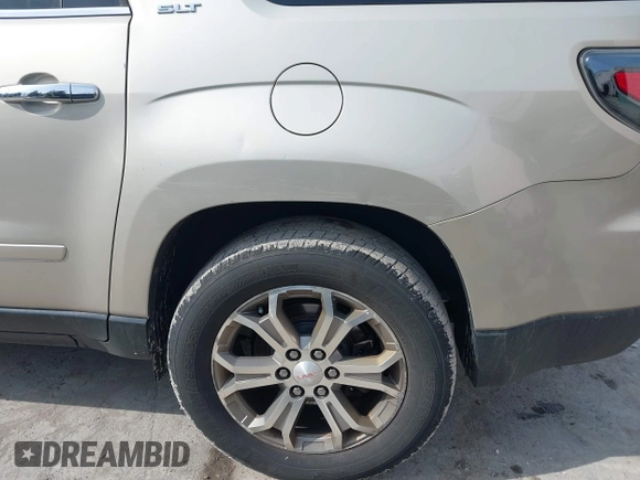 2014 GMC Acadia SLT z VIN 1GKKVRKD2EJ165066, wystawiony jako IAAI lot #41629615 z przebiegiem 193 811 mil mil oraz . Historia ofert i sprzedaży dostępna na DreamBid. Obrazek 6.