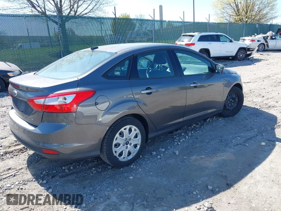 2012 Ford Focus SE with VIN 1FAHP3F27CL276208, listed as a IAAI auction lot 41995770 with 98,004 mi miles. Bid and sale history available at carsss.com. Image 4.