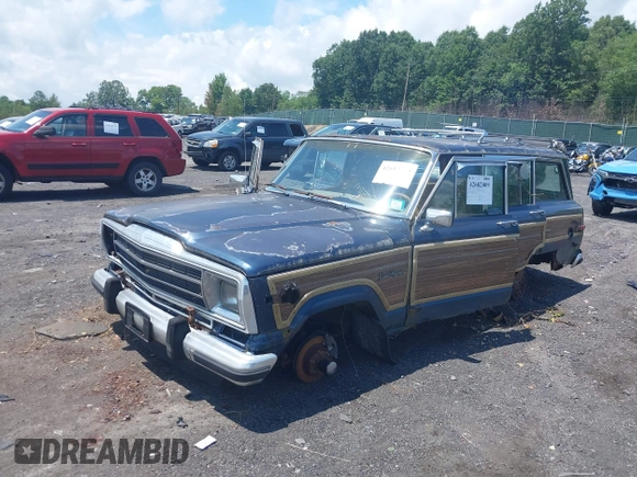 1988 Jeep Grand Wagoneer with VIN 1JCNJ15U7JT237152, listed as a IAAI auction lot 42682009 with 159,950 mi miles and . Bid and sale history available at DreamBid. Image 2.