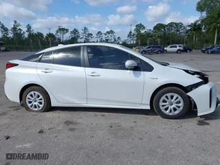2022 Toyota Prius L Eco with VIN JTDKAMFU5N3181724, listed as a IAAI auction lot 41568635 with 67,360 mi miles. Bid and sale history available at carsss.com. Image 14.
