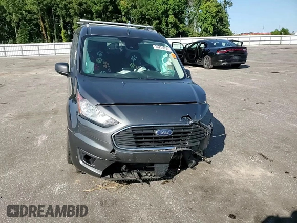 2021 Ford Transit Connect XLT with VIN NM0GS9F27M1504144, listed as a Copart auction lot 70214034 with 45,827 mi miles and Salvage title. Bid and sale history available at DreamBid. Image 11.