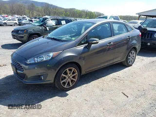 2015 Ford Fiesta SE with VIN 3FADP4BJ6FM105731, listed as a IAAI auction lot 41994903 with 150,189 mi miles. Bid and sale history available at carsss.com. Image 2.