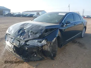 2017 Lincoln MKZ Hybrid Reserve z VIN 3LN6L5MU2HR634929, wystawiony jako IAAI lot #42065636 z przebiegiem 100 165 mil mil oraz . Historia ofert i sprzedaży dostępna na DreamBid. Obrazek 6.
