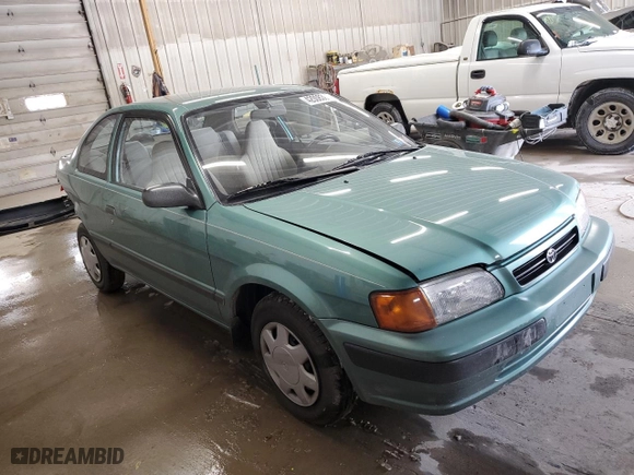 1995 Toyota Tercel DX with VIN JT2EL56D9S0031098, listed as a Copart auction lot 42008395 with 115,102 mi miles and Salvage Title. Bid and sale history available at carsss.com. Image 4.