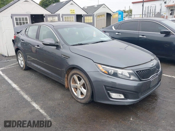2015 Kia Optima LX z VIN KNAGM4A73F5624101, wystawiony jako IAAI lot #40746046 z przebiegiem 166 468 mil mil oraz . Historia ofert i sprzedaży dostępna na DreamBid. Obrazek 1.