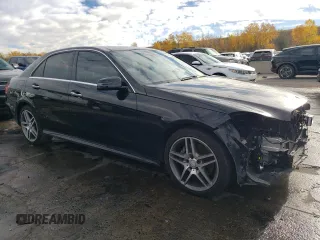 2016 Mercedes-Benz E-Class E 400 with VIN WDDHF6HB4GB188360, listed as a Copart auction lot 77592084 with 55,728 mi miles and Salvage Title. Bid and sale history available at carsss.com. Image 4.