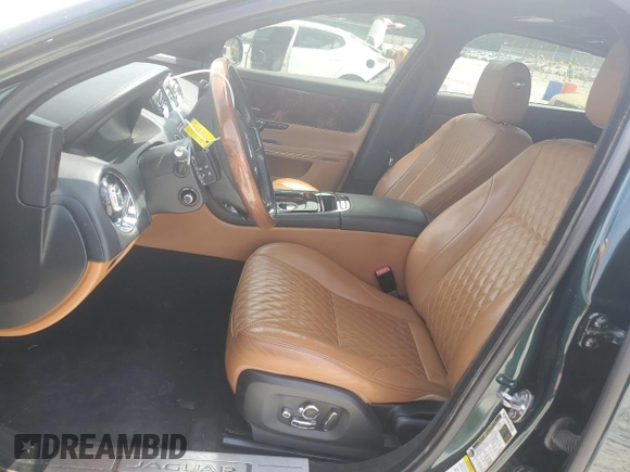 2017 Jaguar XJ Portfolio with VIN SAJWJ2GD7H8W11167, listed as a Copart auction lot 57103195 with 17,355 mi miles and Salvage title. Bid and sale history available at DreamBid. Image 7.