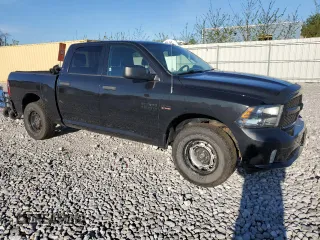 2015 Ram 1500 Tradesman with VIN 3C6RR7KTXFG676335, listed as a Copart auction lot 55204235 with 104,507 mi miles and Salvage title. Bid and sale history available at DreamBid. Image 4.
