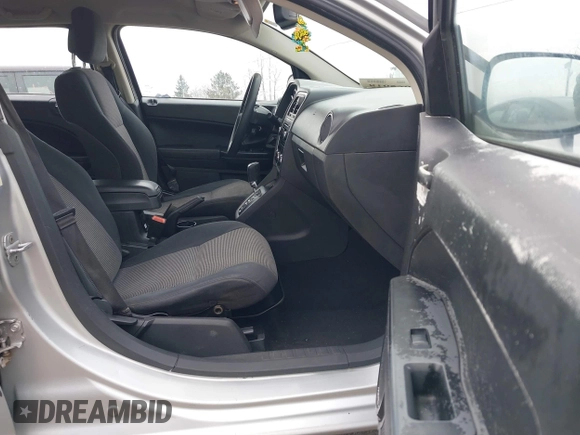 2011 Dodge Caliber Mainstreet with VIN 1B3CB3HA2BD238032, listed as a IAAI auction lot 41865918 with 98,022 mi miles and . Bid and sale history available at DreamBid. Image 5.