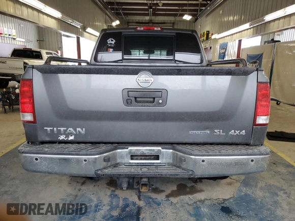 2015 Nissan Titan SL с VIN 1N6BA0EC9FN508811, выставлен на аукционе Copart как лот 45810395 с пробегом 117 333 миль миль и Списание • Salvage title. История ставок и продаж доступна на DreamBid. Изображение 6.