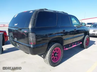 2004 Chevrolet Tahoe LT with VIN 1GNEC13ZX4R234118, listed as a IAAI auction lot 41840881 with 360,534 mi miles. Bid and sale history available at carsss.com. Image 4.