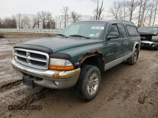 1999 Dodge Dakota SLT with VIN 1B7GG22X4XS309050, listed as a Copart auction lot 82030864 with 141,396 mi miles and Non Repairable. Bid and sale history available at carsss.com. Image 1.