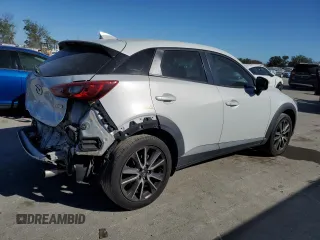 2018 Mazda CX-3 Touring with VIN JM1DKDC77J0305749, listed as a Copart auction lot 86524474 with 112,562 mi miles and Salvage Title. Bid and sale history available at DreamBid. Image 3.