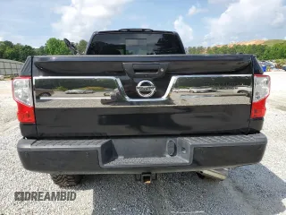 2016 Nissan Titan SL z VIN 1N6BA1F46GN513494, wystawiony jako Copart lot #55271185 z przebiegiem 97 890 mil mil oraz Tytuł czysty. Historia ofert i sprzedaży dostępna na DreamBid. Obrazek 6.