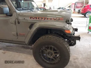 2021 Jeep Gladiator Mojave with VIN 1C6JJTEG1ML596109, listed as a IAAI auction lot 41783913 with 71,112 mi miles and . Bid and sale history available at DreamBid. Image 21.