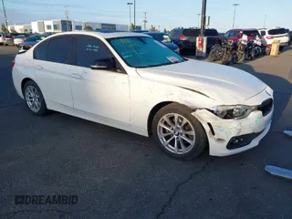 2018 BMW 3 Series 320i with VIN WBA8E1G54JNU90990, listed as a IAAI auction lot 41801197 with 140,603 mi miles. Bid and sale history available at carsss.com. Image 1.