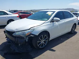 2015 Toyota Camry XLE with VIN 4T1BF1FK4FU477825, listed as a IAAI auction lot 41988429 with 156,886 mi miles and . Bid and sale history available at DreamBid. Image 2.