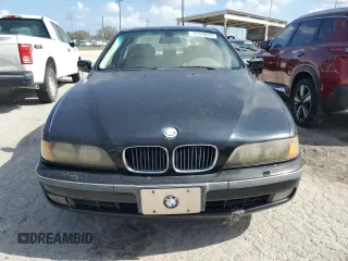 2000 BMW 5 Series 528iA with VIN WBADM6340YGU16735, listed as a Copart auction lot 77249644 with 0 mi miles and Salvage Title. Bid and sale history available at carsss.com. Image 5.