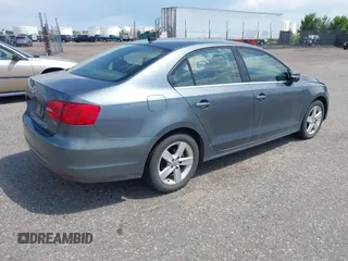 2013 Volkswagen Jetta TDI w/Premium with VIN 3VWLL7AJ2DM278015, listed as a IAAI auction lot 42619604 with 96,843 mi miles and . Bid and sale history available at DreamBid. Image 4.