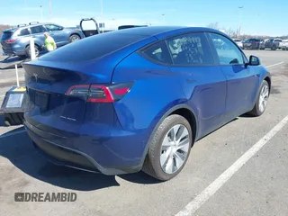 2020 Tesla Model Y Long Range with VIN 5YJYGDEF4LF005534, listed as a IAAI auction lot 41830910 with 32,438 mi miles and . Bid and sale history available at DreamBid. Image 4.