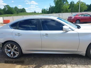 2013 Infiniti M with VIN JN1BY1AP0DM513527, listed as a IAAI auction lot 42170513 with 194,908 mi miles and . Bid and sale history available at DreamBid. Image 14.
