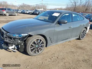 2024 BMW i4 xDrive40 with VIN WBY83FB07RFR89708, listed as a IAAI auction lot 41455115 with NaN miles. Bid and sale history available at carsss.com. Image 24.