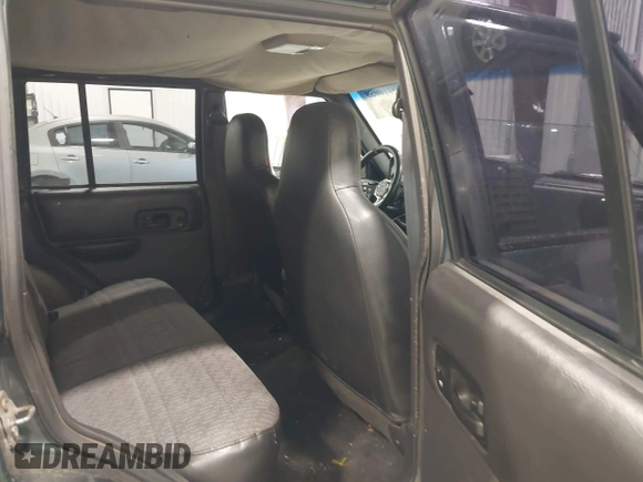 2000 Jeep Cherokee with VIN 1J4FF48SXYL116106, listed as a IAAI auction lot 42610059 with 191,513 mi miles and . Bid and sale history available at DreamBid. Image 8.