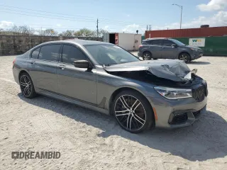 2019 BMW 7 Series 750i with VIN WBA7F0C53KGM24364, listed as a Copart auction lot 53947725 with 71,022 mi miles and Salvage Title. Bid and sale history available at carsss.com. Image 4.