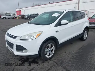 2013 Ford Escape SE with VIN 1FMCU9G93DUA17816, listed as a IAAI auction lot 41688140 with 129,738 mi miles. Bid and sale history available at carsss.com. Image 17.