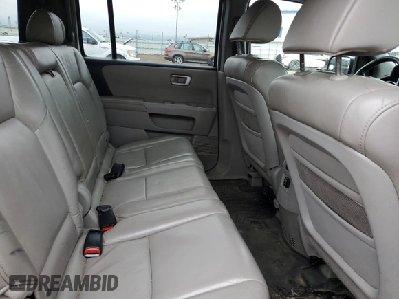 2011 Honda Pilot EX-L z VIN 5FNYF4H5XBB049932, wystawiony jako Copart lot #59227445 z przebiegiem 217 840 mil mil oraz Czysty tytuł • Clean title. Historia ofert i sprzedaży dostępna na DreamBid. Obrazek 11.