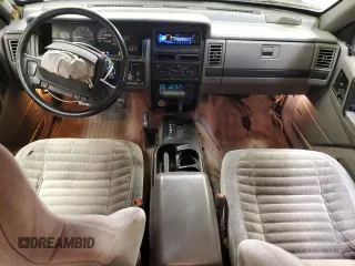 1993 Jeep Grand Cherokee Laredo with VIN 1J4GZ58SXPC554642, listed as a Copart auction lot 83268254 with 266,063 mi miles and Salvage Title. Bid and sale history available at carsss.com. Image 8.