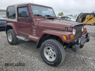 2001 Jeep Wrangler Sahara z VIN 1J4FA59SX1P305100, wystawiony jako Copart lot #58606685 z przebiegiem 76 856 mil mil oraz Czysty tytuł • Clean title. Historia ofert i sprzedaży dostępna na DreamBid. Obrazek 4.