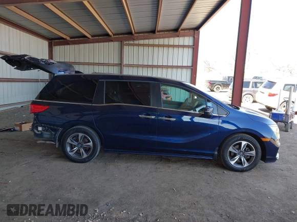 2020 Honda Odyssey Touring with VIN 5FNRL6H82LB015715, listed as a IAAI auction lot 41915849 with 69,603 mi miles and . Bid and sale history available at DreamBid. Image 14.