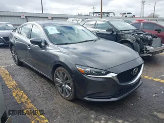 2021 Mazda 6 Grand Touring with VIN JM1GL1TY7M1609423, listed as a IAAI auction lot 41571966 with 80,485 mi miles. Bid and sale history available at carsss.com. Image 1.