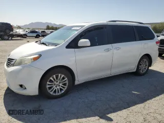2013 Toyota Sienna XLE AAS with VIN 5TDYK3DC3DS297738, listed as a Copart auction lot 61016785 with Not provided miles and Salvage title. Bid and sale history available at DreamBid. Image 1.