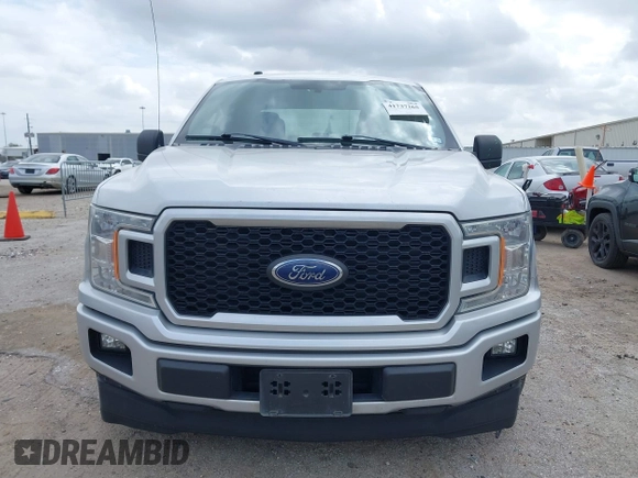 2018 Ford F-150 XL with VIN 1FTEW1CP9JKC79991, listed as a IAAI auction lot 41737265 with 123,655 mi miles and . Bid and sale history available at DreamBid. Image 12.