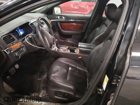 2014 Lincoln MKS with VIN 1LNHL9DK3EG611354, listed as a Copart auction lot 49008525 with 114,232 mi miles and Salvage Title. Bid and sale history available at carsss.com. Image 7.